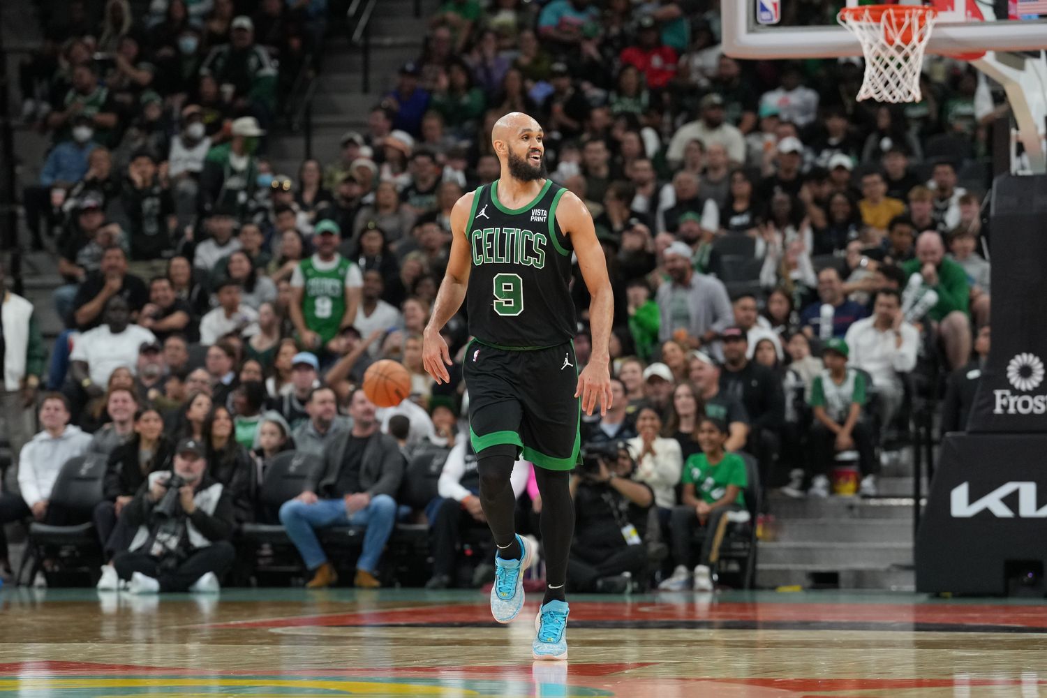 Dec 31, 2023; San Antonio, Texas, USA; Boston Celtics guard Derrick White (9) smiles in the second half against the San Antonio Spurs at Frost Bank Center.